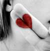 Girl making heart with fingers