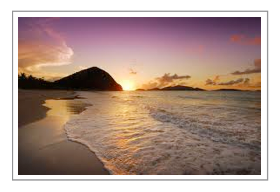 Sunset on the beach with hills