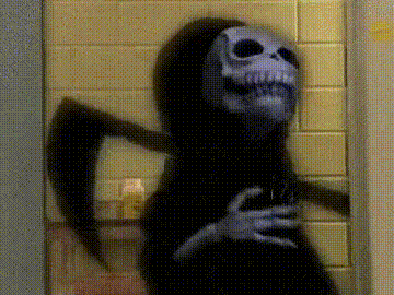 laughing evil creature gif