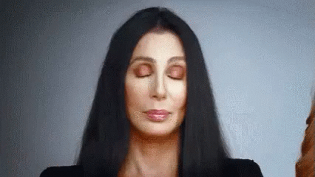 Cher shaking head rolling her eyes
