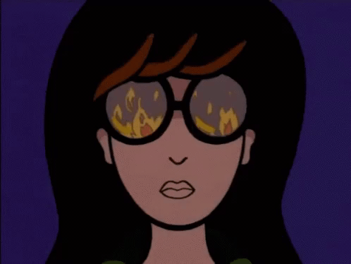 lady wearing sunglasses with burning fire reflection